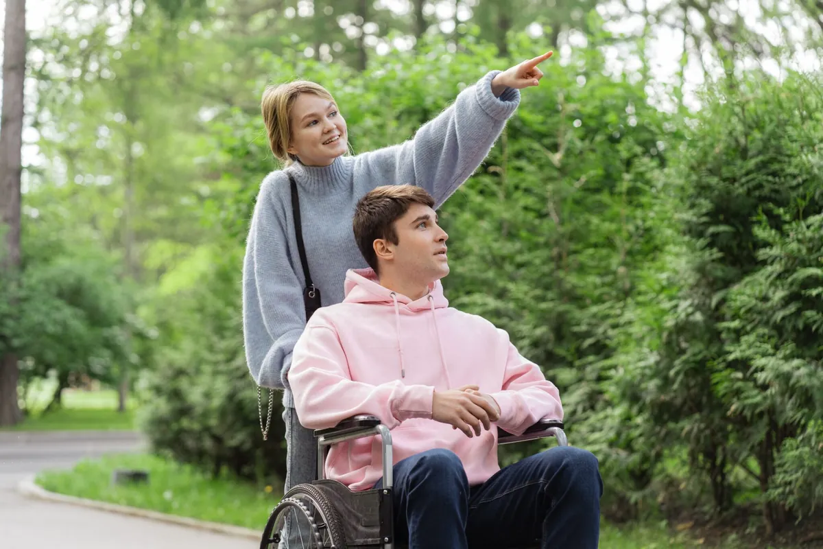 A Divine Care SA support worker talking with a client